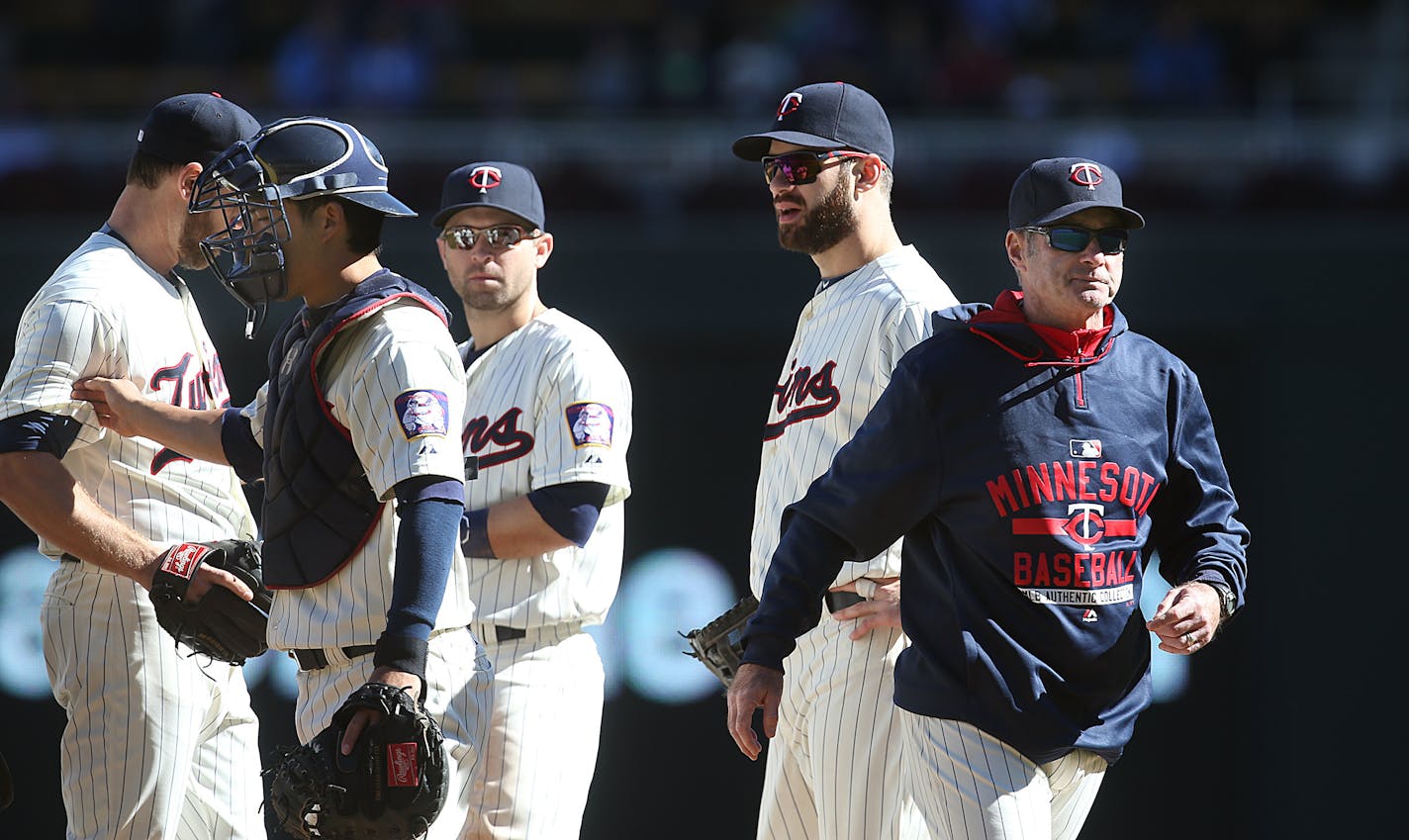 Twins manager Paul Molitor walked back to the dugout after making a pitching change in 2015.