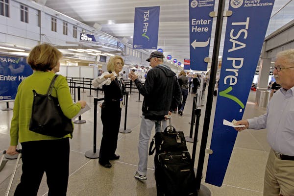 Passengers made their way through the TSA Pre area at Terminal 1 at MSP Airport, Wednesday.