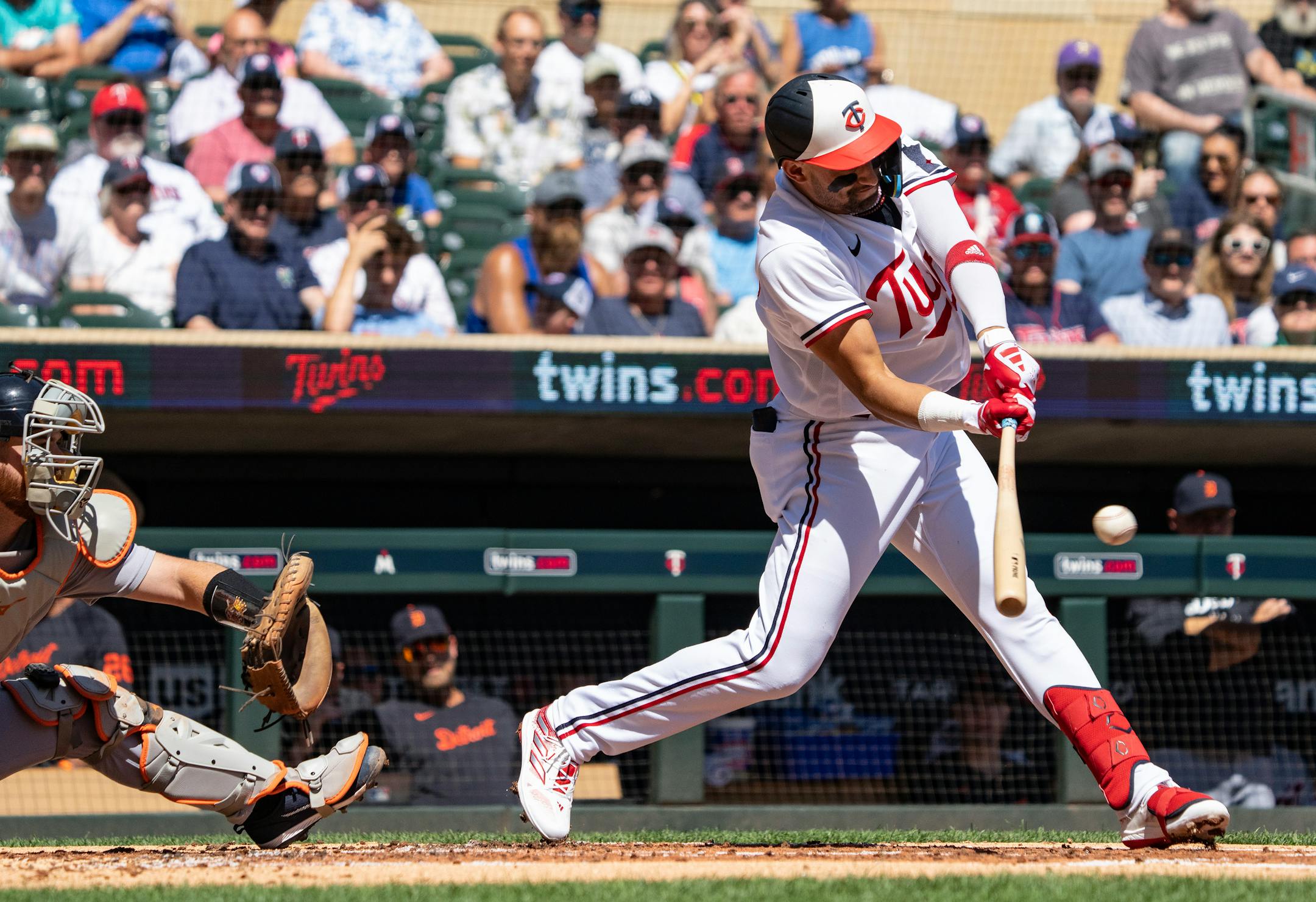 Minnesota Twins third baseman Royce Lewis (23) hits the ball against the Detroit Tigers in the first inning.