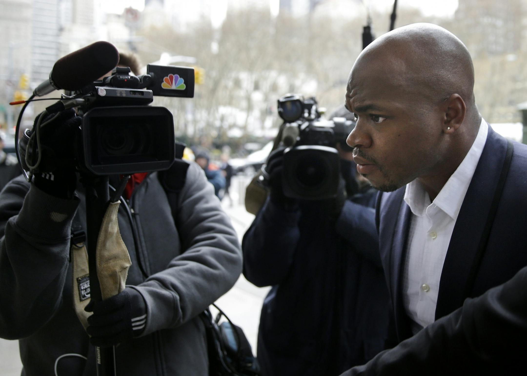 Vikings running back Adrian Peterson arrived for a hearing for the appeal of his suspension in New York on Tuesday.