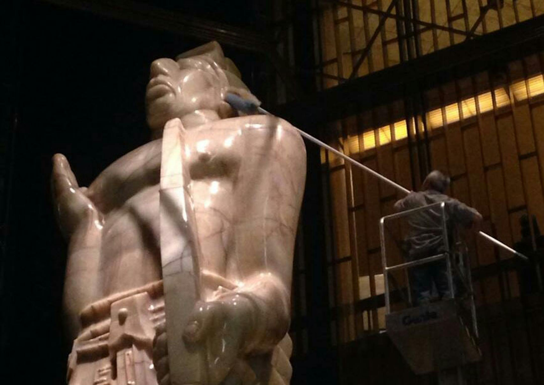 The 36-foot statue in the Ramsey County courthouse gets a cleaning.