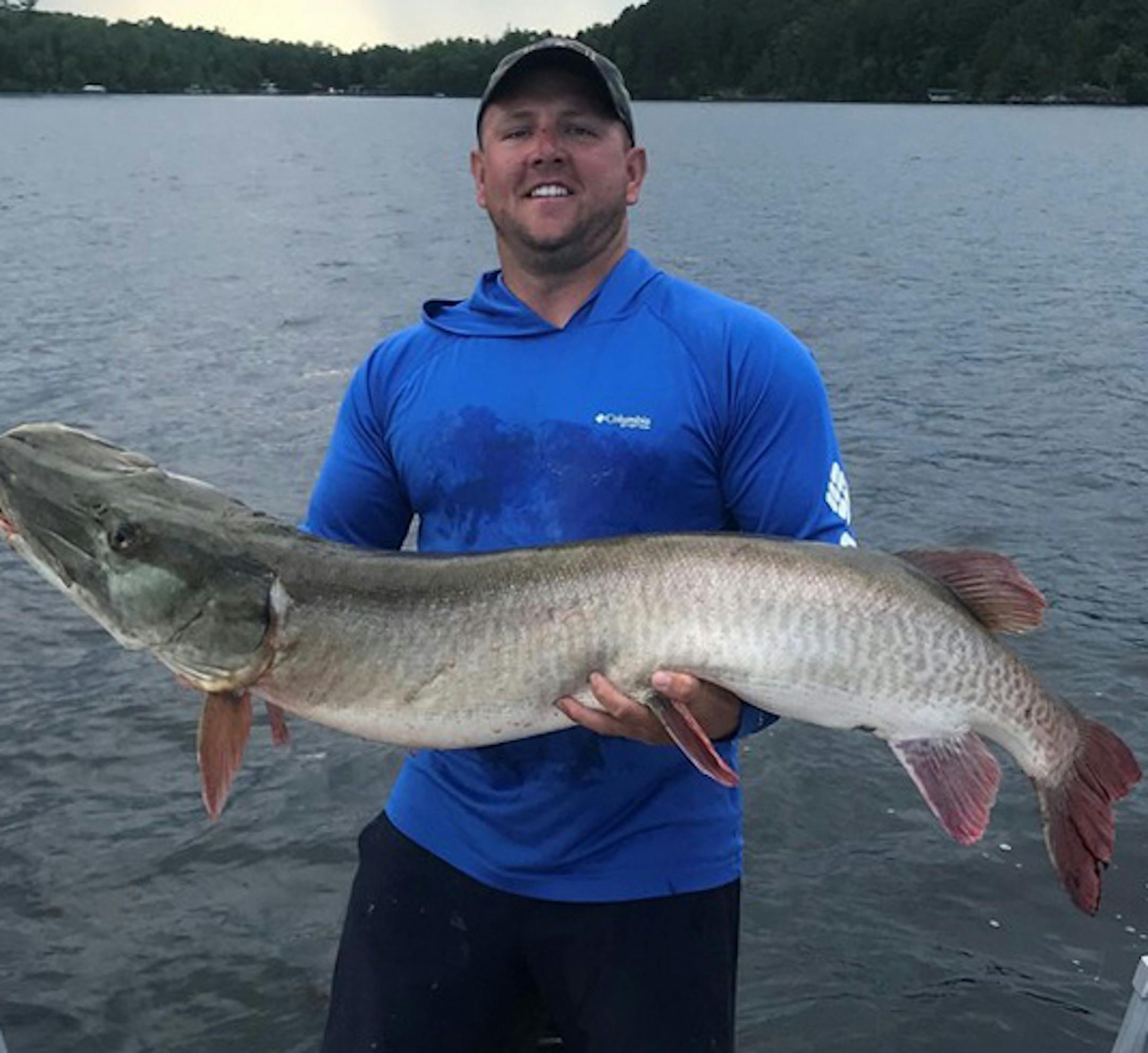 Corey Kitzmann of Davenport, Iowa, owns the new Minnesota muskie release record. He caught this 57 1/4 inch fish while on Lake Vermilion on Aug. 6, 2019.