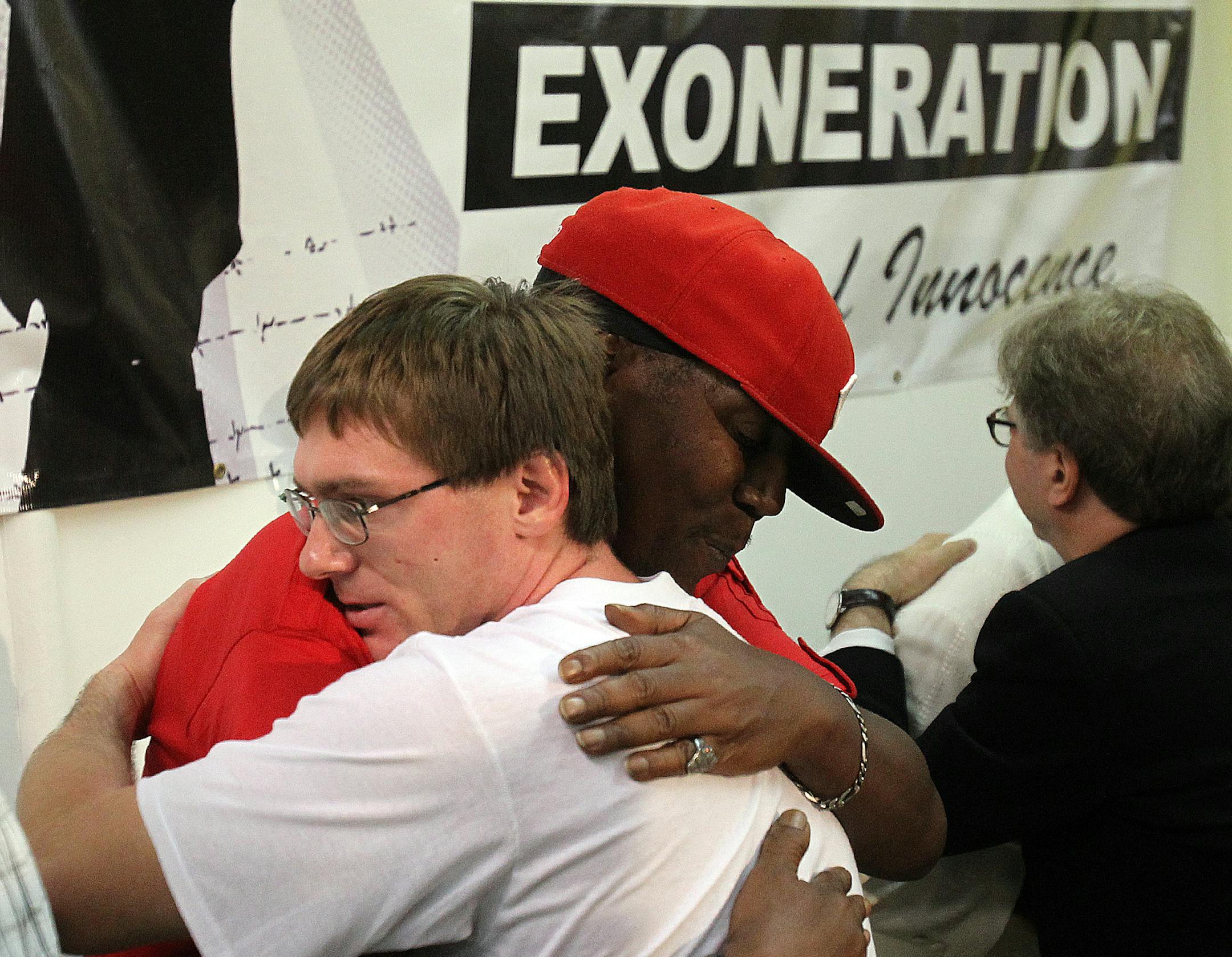 Damon Thibodeaux is embraced by Derrick James, himself a former death row inmate, following a press conference at Resurrection After Exoneration headquarters Friday, Sept. 28, 2012 in New Orleans. Thibodeaux, a man wrongly convicted of raping and killing his 14-year-old step-cousin in 1997 was released Friday from Louisiana's death row after DNA tests found him to be innocent. (AP Photo/The Times-Picayune, Michael Democker ) MAGS OUT; NO SALES; USA TODAY OUT