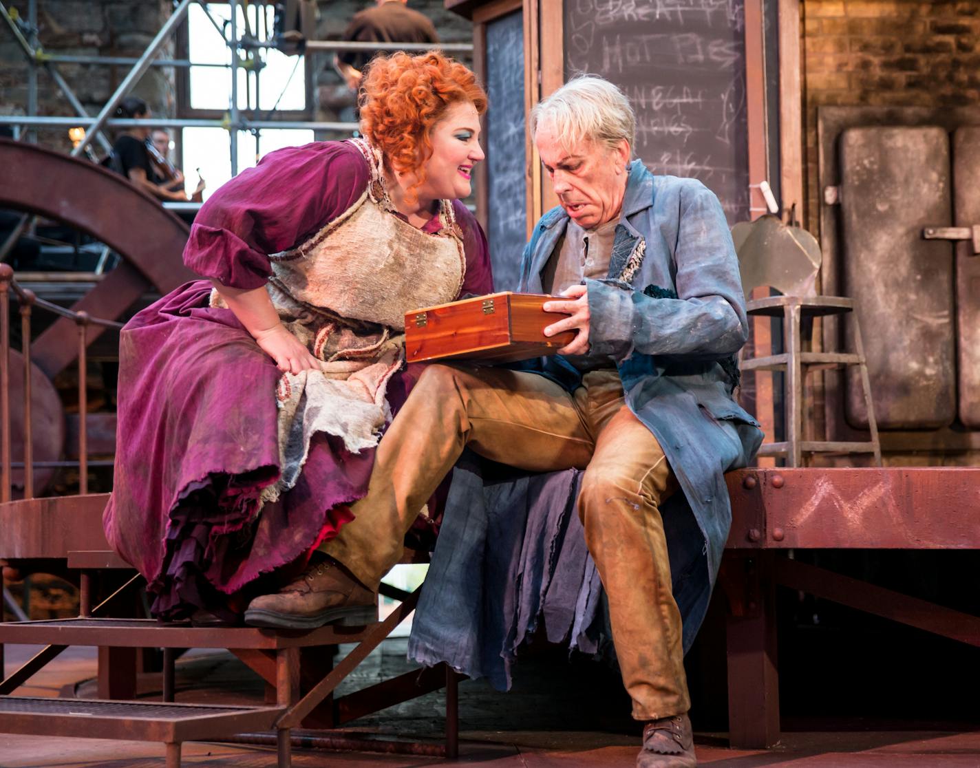 Robert Orth plays Sweeney Todd and Catherine Cook is Mrs. Lovett in the Mill City Summer Opera production being staged in the ruins of the old Washburn "A" Mill on the Minneapolis riverfront. (photo by Dan Norman)