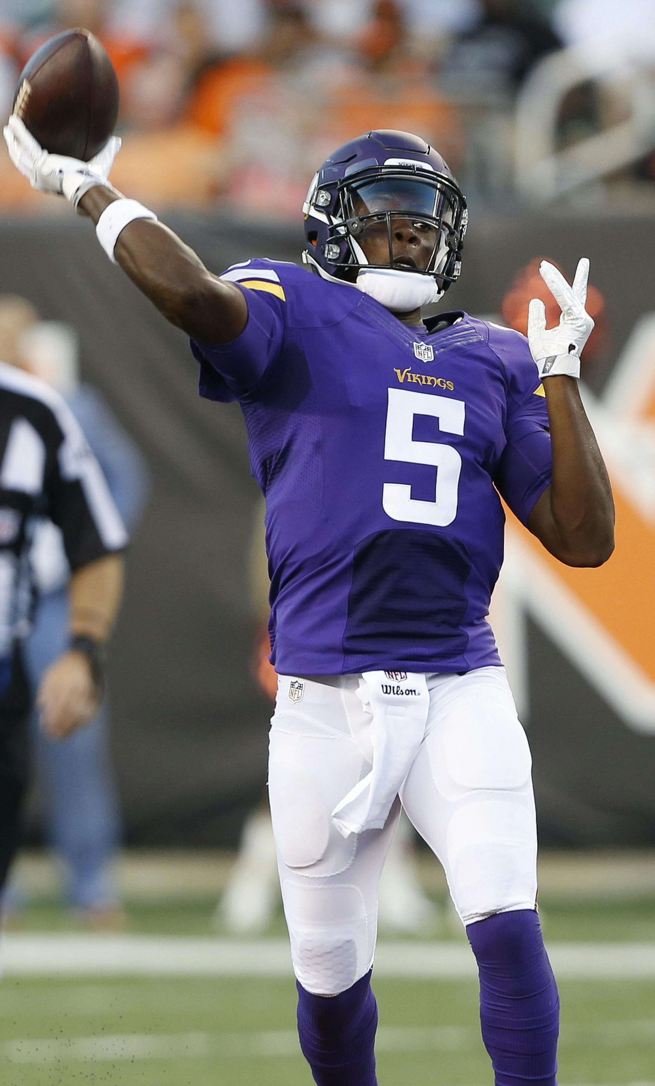 Minnesota Vikings quarterback Teddy Bridgewater (5) throws to wide receiver Charles Johnson for a touchdown during the first half of an NFL preseason football game against the Cincinnati Bengals, Friday, Aug. 12, 2016, in Cincinnati. (AP Photo/Frank Victores) ORG XMIT: MIN2016081221331297