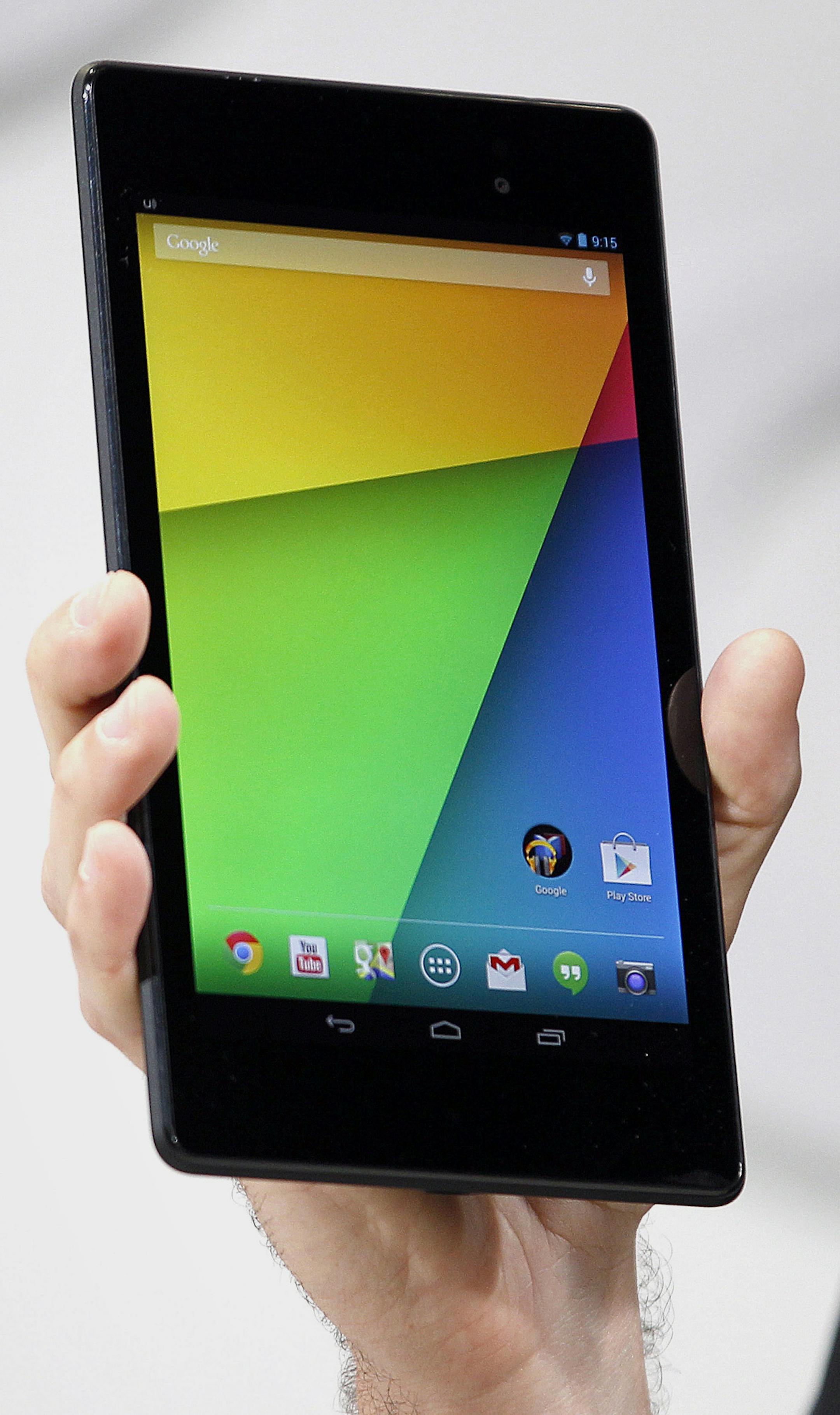 Hugo Barra, vice president of product management for Android at Google Inc., displays the new Nexus 7 tablet while speaking at an event in San Francisco, California, U.S., on Wednesday, July 24, 2013. Google Inc., owner of the worldís most popular search engine, today unveiled an updated version of its Nexus 7 tablet as it steps up efforts against rivals such as Apple Inc. and Microsoft Corp. Photographer: Tony Avelar/Bloomberg *** Local Caption *** Hugo Barra ORG XMIT: 174522527