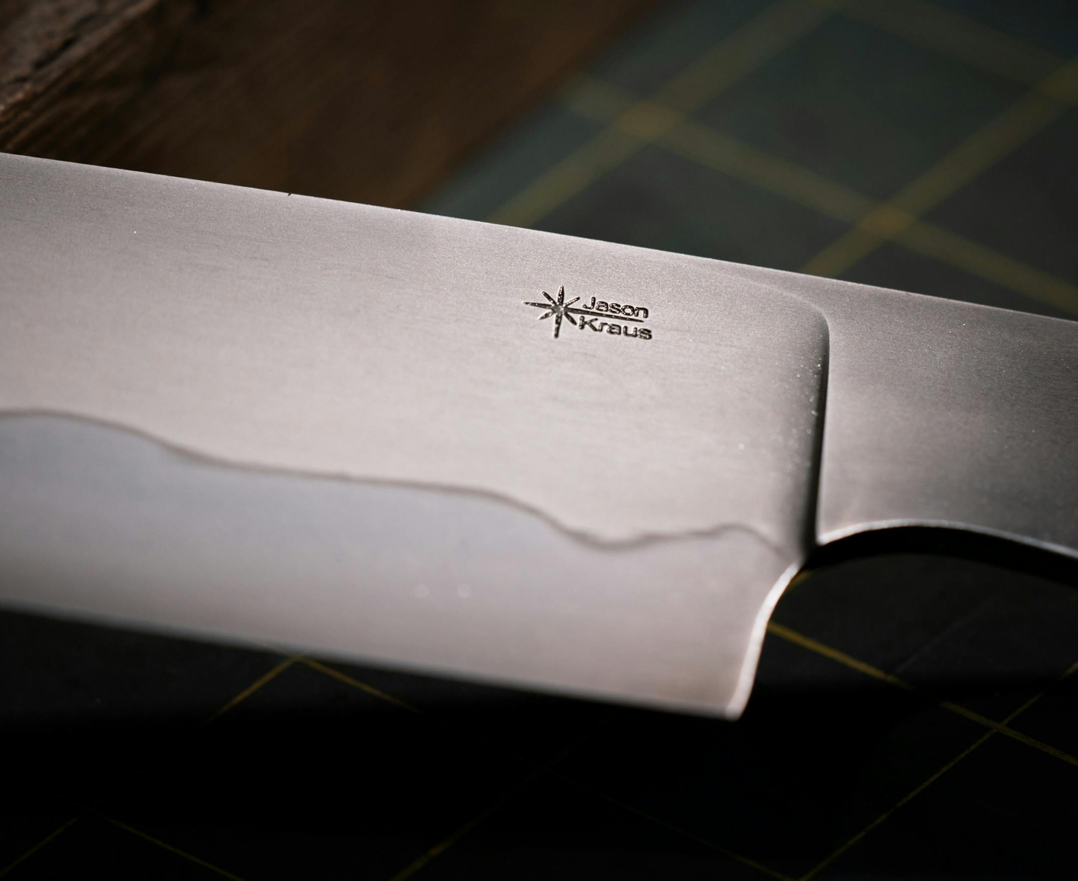 The makers mark on Jason Kraus knives.