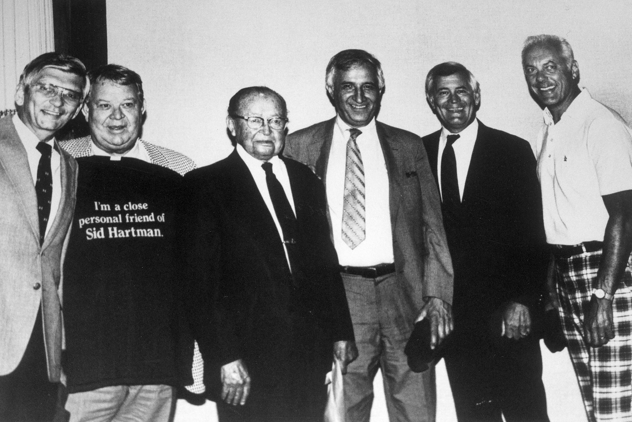 Appearing at a roast for Sid Hartman. From left, Roger Erickson of WCCO Radio, then-Twins owner Calvin Griffith, then-Star Tribune sports editor Charlie Johnson, sports columnist Sid Hartman, then-University of Minnesota athletic director Paul Giel, and Minnesota Vikings coach Bud Grant. Photo courtesy of Sid Hartman.