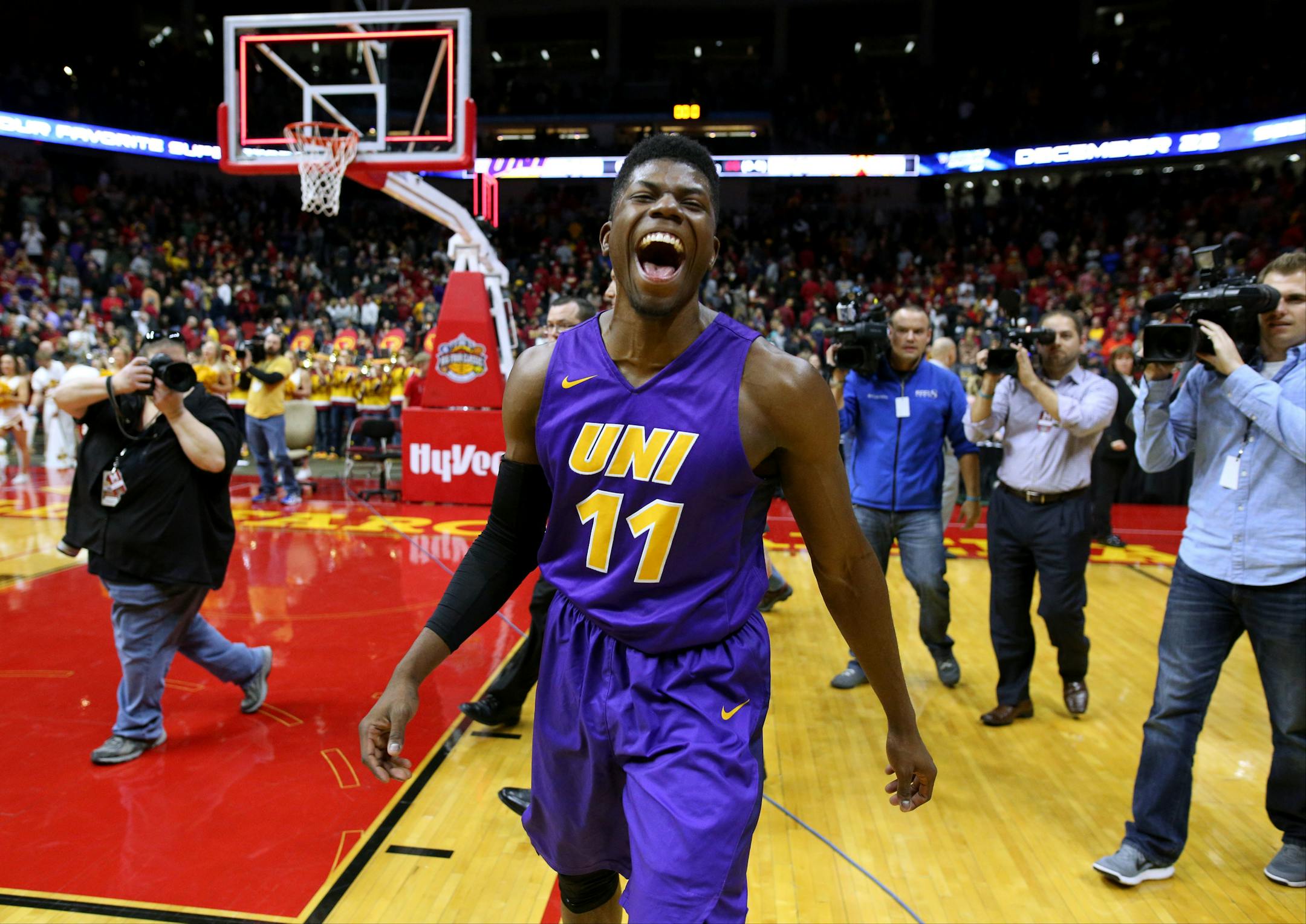 Northern Iowa guard Wes Washpun celebrates after the final buzzer at an NCAA college basketball game against Iowa State, Saturday, Dec. 19, 2015, in Des Moines, Iowa. Northern Iowa won 81-79. (AP Photo/Justin Hayworth)