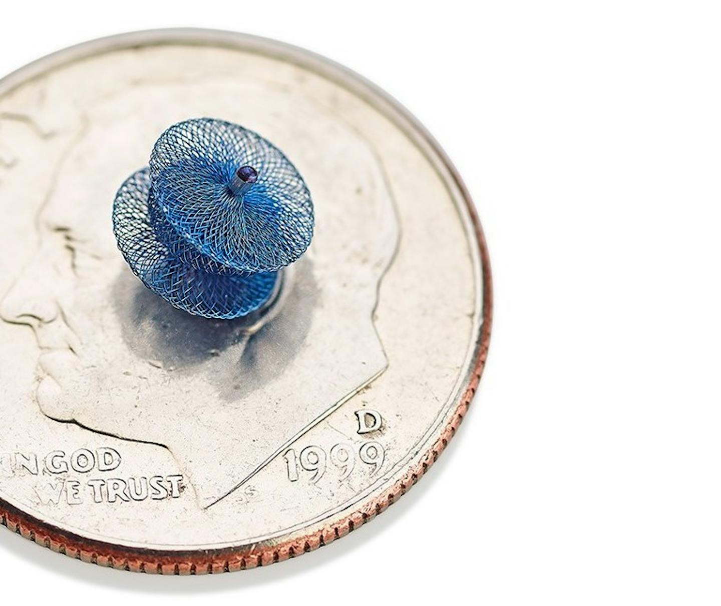 The Piccolo, (originally designed by St. Jude Medical) is the smallest transcatheter device ever approved for pediatric patients, just larger than Roosevelt's ear on the U.S. dime. Photo courtesy Abbott Laboratories.