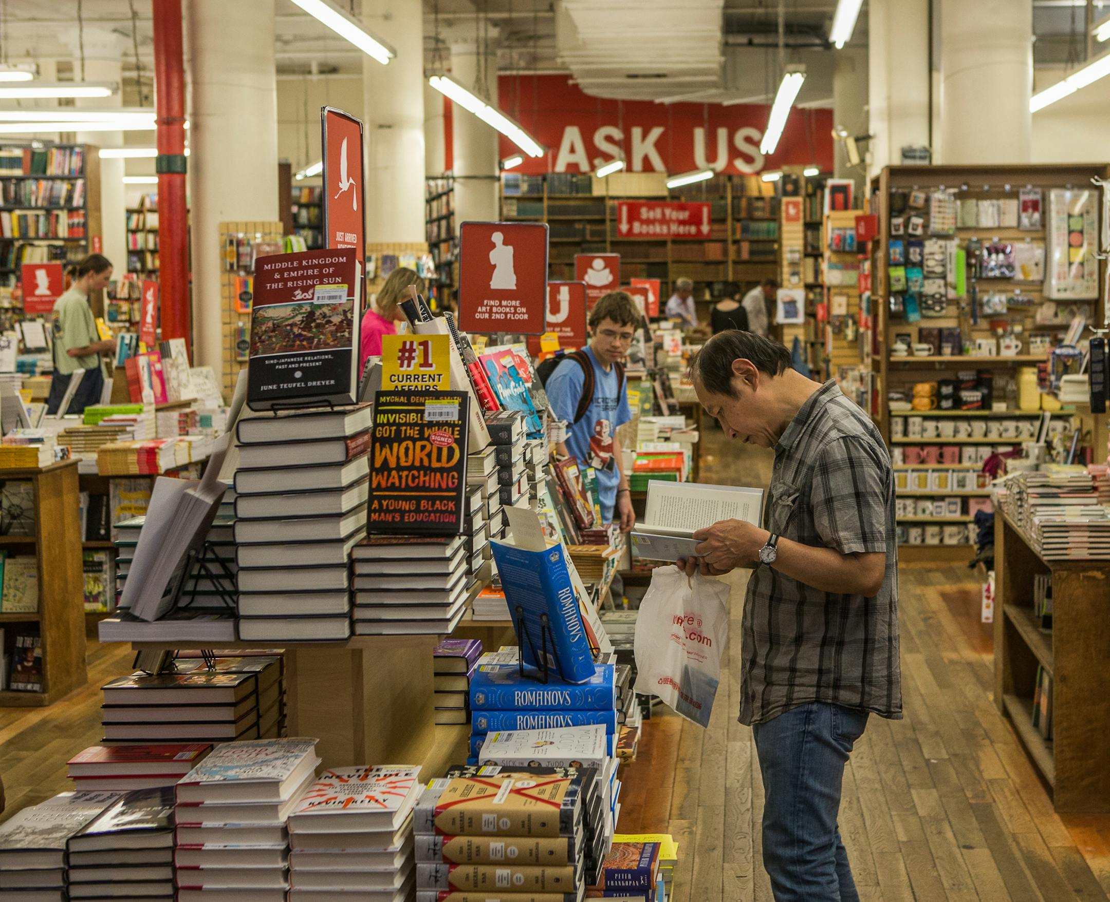 Customers shop at the Strand Book Store in New York, June 21, 2016. Four decades ago, the Strand created a short literature test for job applicants, which has become as much a part of the bookstore’s identity as its tote bags. (George Etheredge/The New York Times)