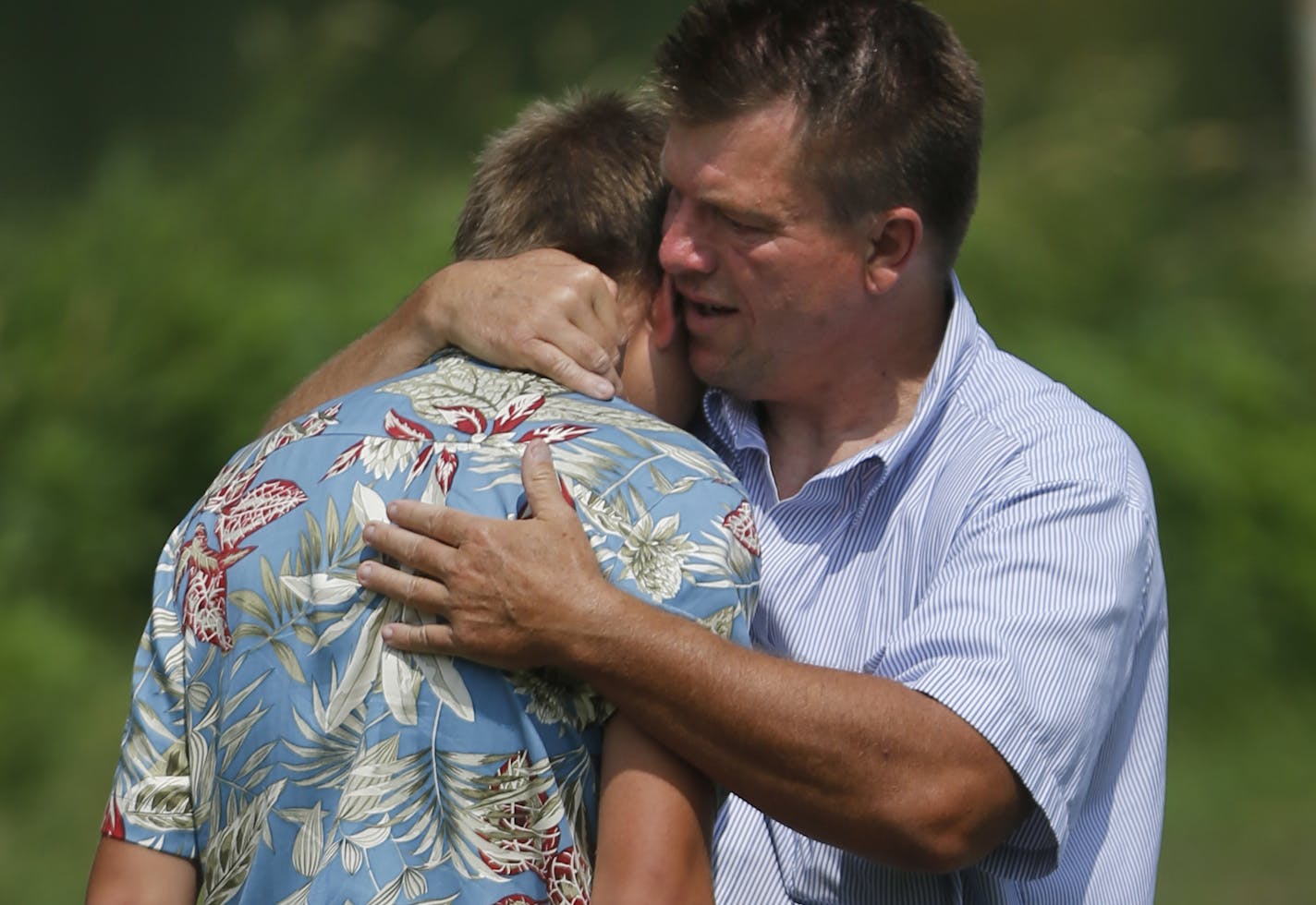 On Lake Nokomis on August 6, 2014, a member of the South High School football player drowned. Members of the football team were cooling off in the lake after practice when the drowning occurred.Head coach Lenny Sedlock comforted one of his players. ] Richard Tsong-Taatarii/rtsong-taatarii@startribune.com