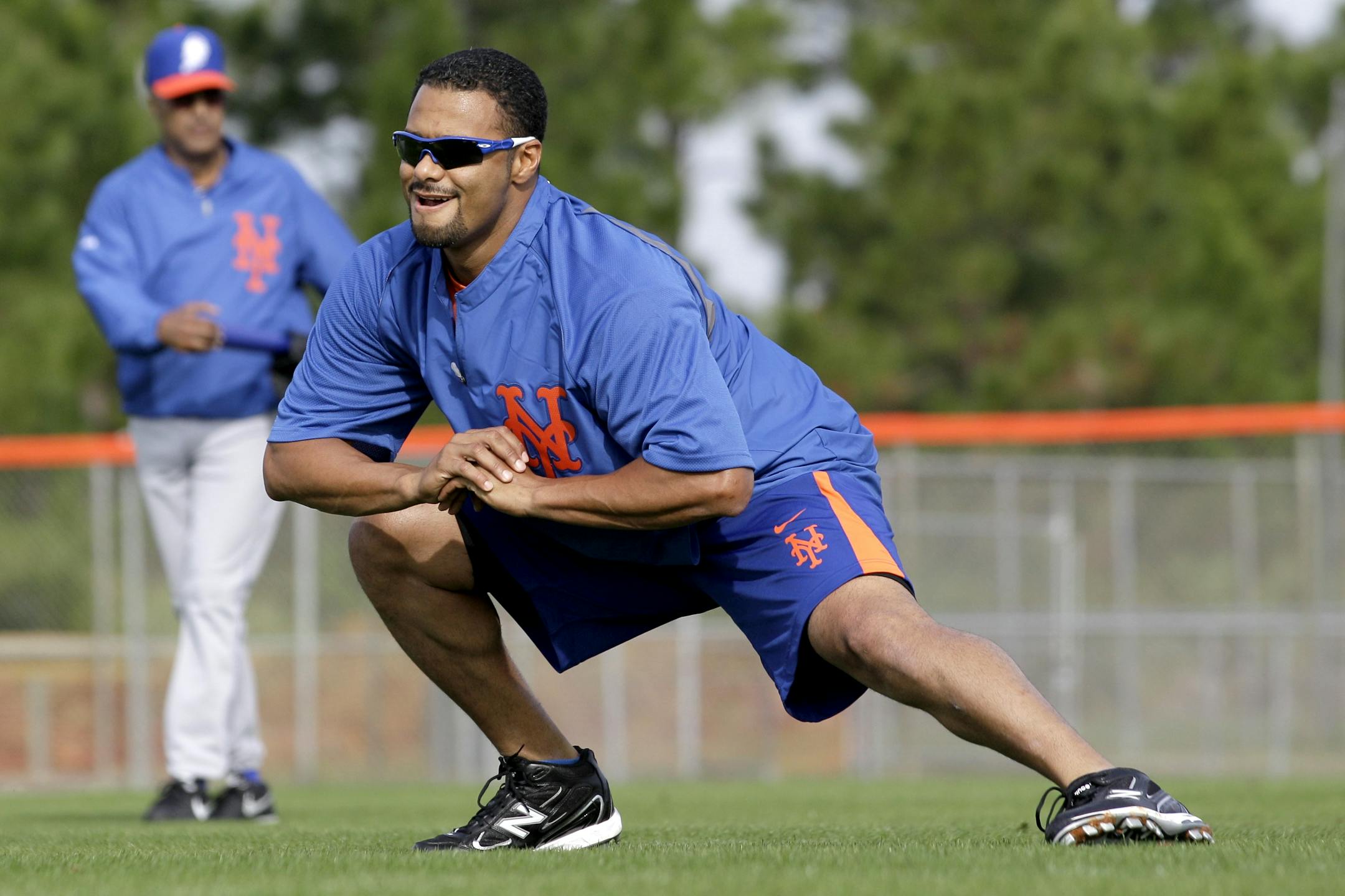 FILE - In the Feb. 16, 2013, file photo, then-New York Mets starting pitcher Johan Santana stretches during spring training baseball in Port St. Lucie, Fla. Santana retired six straight batters on Tuesday night, Jan. 13, 2015, in the Venezuelan Winter League, the first outing for the two-time AL Cy Young Award winner since he tore an Achilles tendon last June. (AP Photo/Julio Cortez, File)