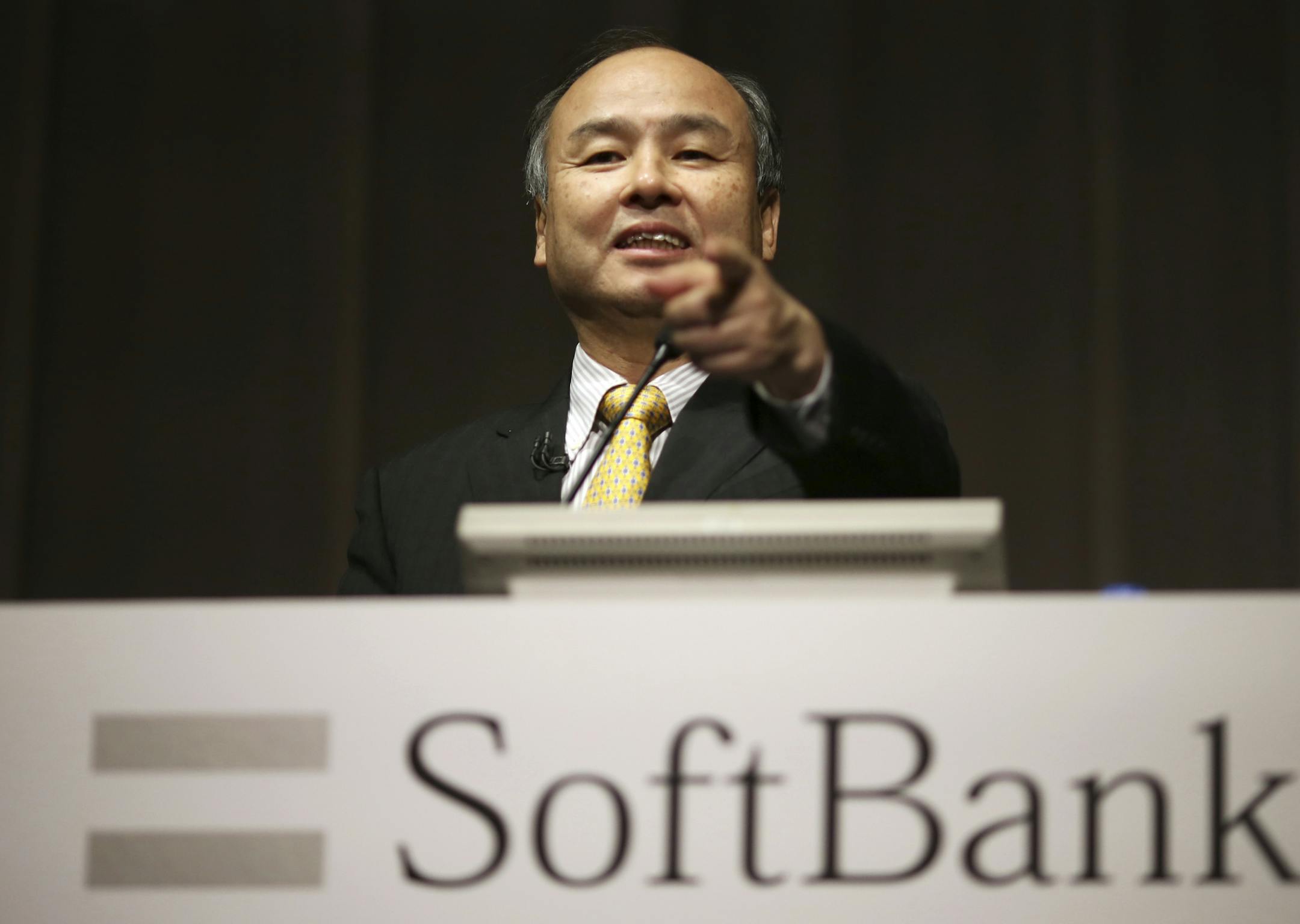 FILE - In this Nov. 4, 2014, file photo, SoftBank founder and Chief Executive Officer Masayoshi Son speaks during a news conference in Tokyo. Japanese technology company SoftBank Group Corp. is buying British semiconductor company ARM Holdings for $31 billion. The agreement, disclosed Monday, July 18, 2016, underlines SoftBank's desire to expand in the Internet of Things, which refers to how almost anything these days has become a computer device that can connect online. SoftBank said ARM has a