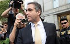 President Donald Trump's longtime personal lawyer, Michael Cohen, leaves New York Federal Court after making a plea deal on Tuesday, Aug. 21, 2018. Co