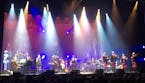 St. Paul Mayor Chris Coleman's bagpipe quartet, right, joined the New Standards for a Pogues classic at the State Theatre.