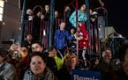 FILE -- Children and adults crowded a playground in Iowa City, Iowa to watch a campaign event on Oct. 25, 2019. Ahead of every presidential election, 