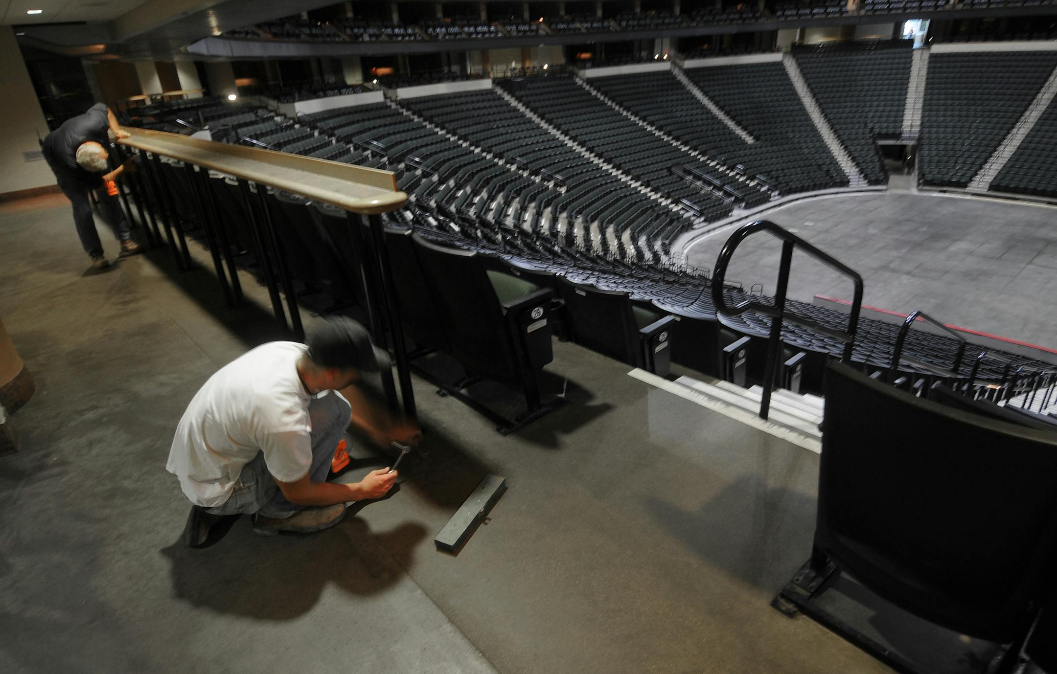 Among the tasks to convert the Xcel Energy Center into center stage for the Republican National Convention was removing the drinking rails behind the seating areas. One of the challenges is finding a place to put all the stuff they take out of the arena, said three men who are leading the behind-the-scene effort.