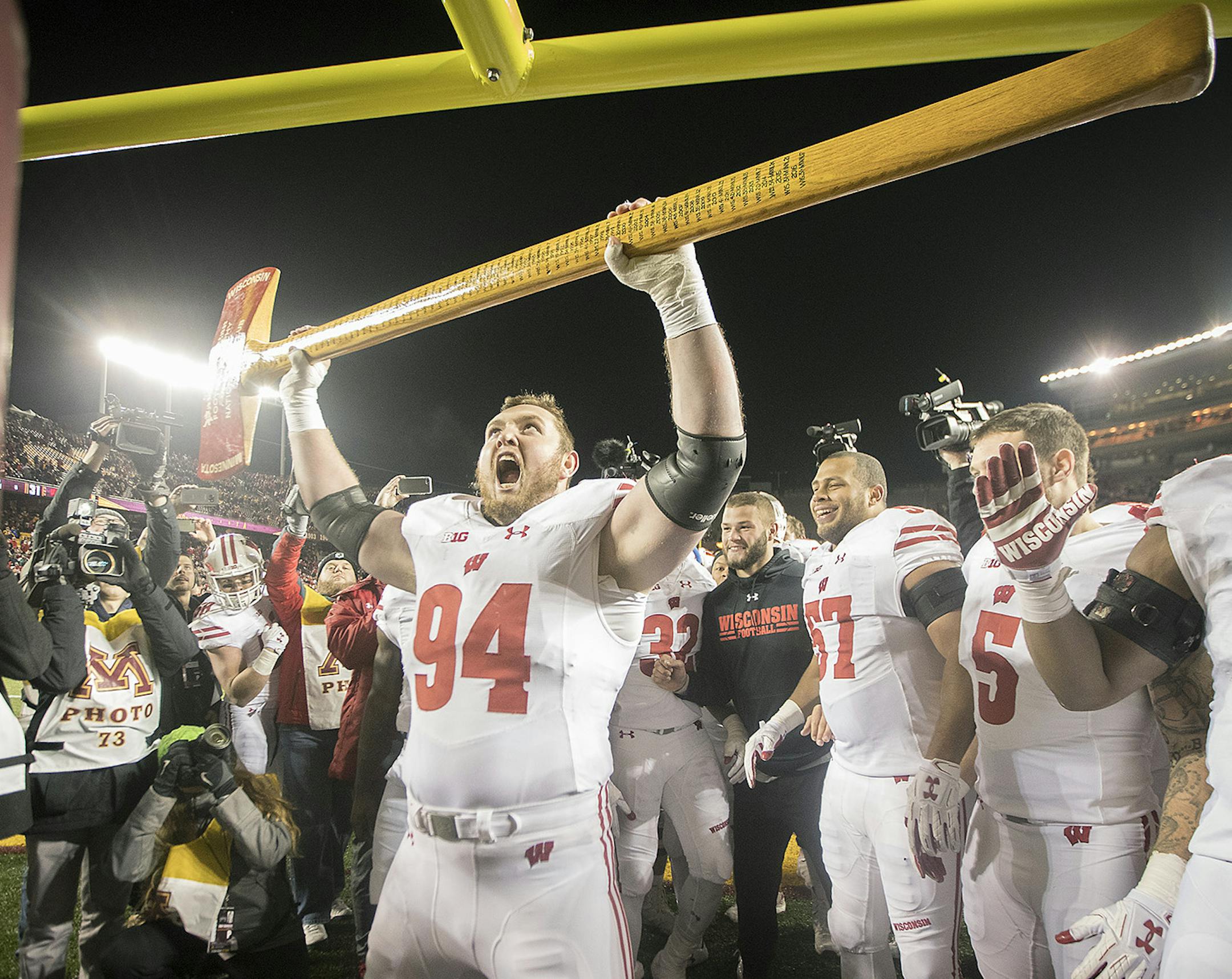 Wisconsin's defensive end Conor Sheehy took the Paul Bunyan's Axe to a Minnesota post after they defeated Minnesota 31-0 at TCF Bank Stadium, Saturday, November 20 2017 in Minneapolis, MN. ] ELIZABETH FLORES ï liz.flores@startribune.com