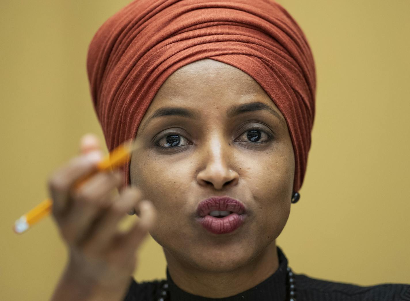 FILE - in this Sept. 24, 2019 file photo, Rep. Ilhan Omar, D-Minn., speaks on Capitol Hill in Washington. Rep. Omar has filed for divorce from her husband. The freshman Democrat cited an "irretrievable breakdown" of her marriage with Ahmed Hirsi in her filing Friday, Oct. 4, 2019, in Hennepin County District Court. (AP Photo/Manuel Balce Ceneta File)