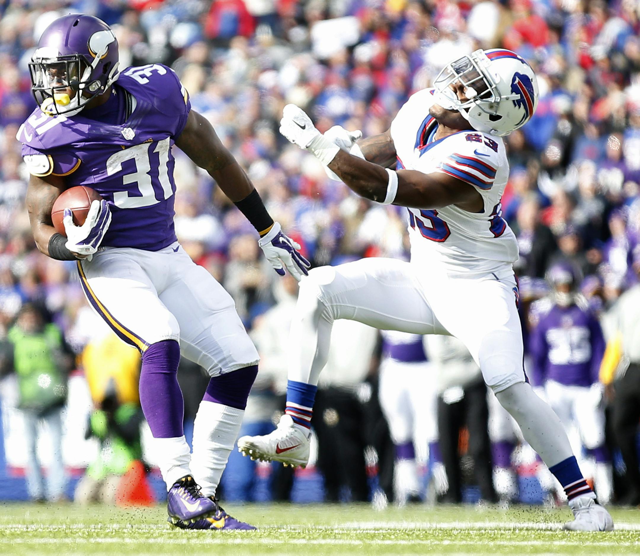 Vikings running back Jerick McKinnon (31) broke away from Aaron Williams (23) in the third quarter. Buffalo beat Minnesota by a final score of 17-16. ] CARLOS GONZALEZ cgonzalez@startribune.com - October 19, 2014 , Orchard Park, NY, Ralph Wilson Stadium, NFL, Minnesota Vikings vs. Buffalo Bills