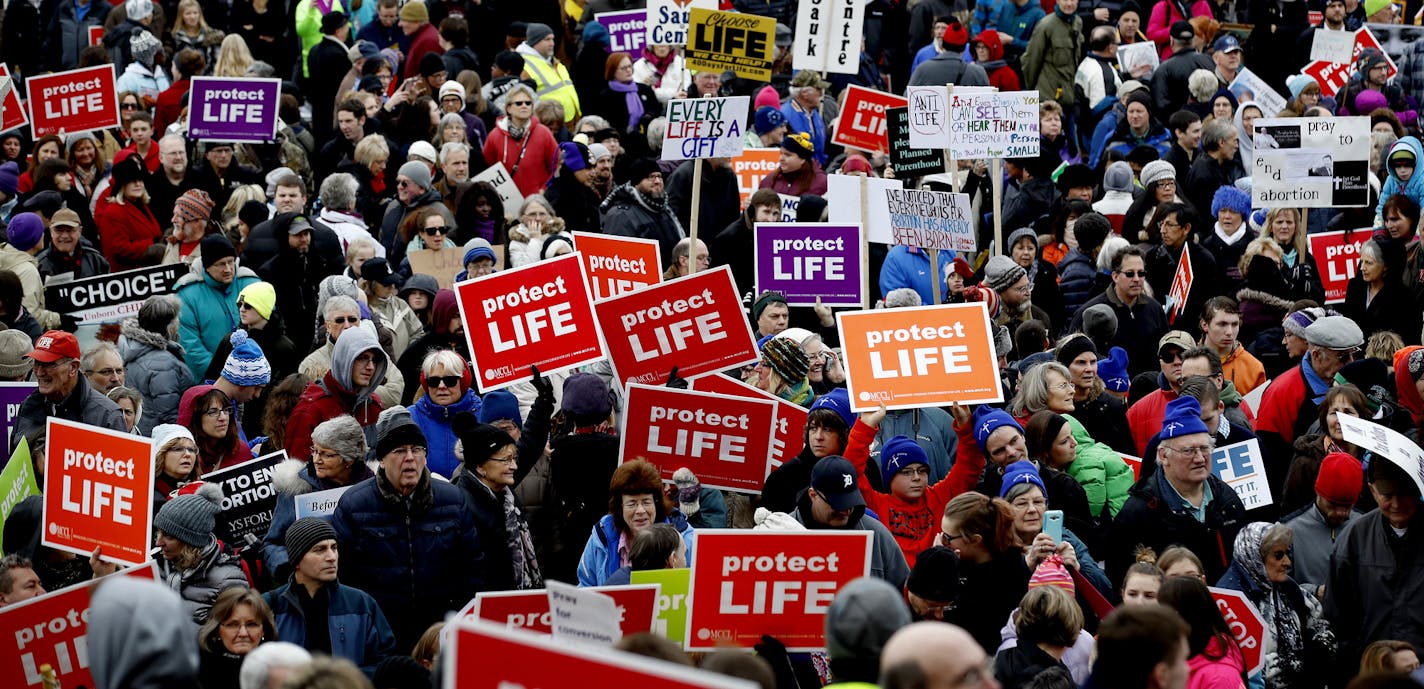 Marchers made their way around the Capitol Mall. Minnesota Citizens Concerned for Life (MCCL) held a march in front of the Minnesota State Capitol on Sunday. ] CARLOS GONZALEZ cgonzalez@startribune.com - January 22, 2017, St. Paul, MN, Minnesota State Capitol, Minnesota Citizens Concerned for Life holds its yearly March for Life rally on the grounds of the State Capitol, to mark the anniversary of the Supreme Court's Roe v. Wade decision.