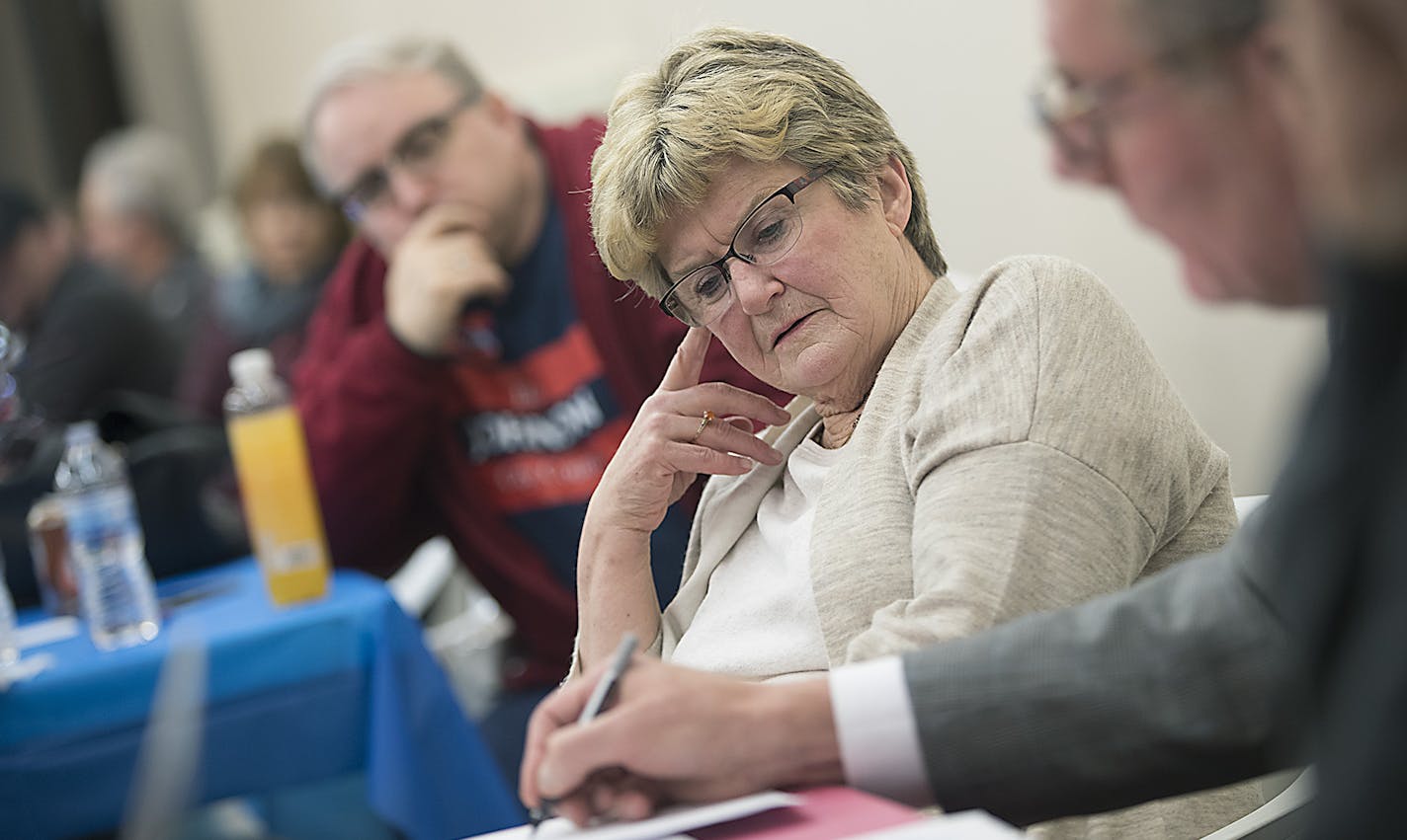 Barb Johnson watched as part of her campaign staff and Brian Rice, right, worked with the numbers coming in at her campaign headquarters, Tuesday, November 7, 2017 in Minneapolis, MN. ] ELIZABETH FLORES &#xef; liz.flores@startribune.com