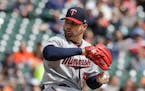 Minnesota Twins starting pitcher Hector Santiago throws during the fourth inning of a baseball game against the Detroit Tigers, Tuesday, April 11, 201