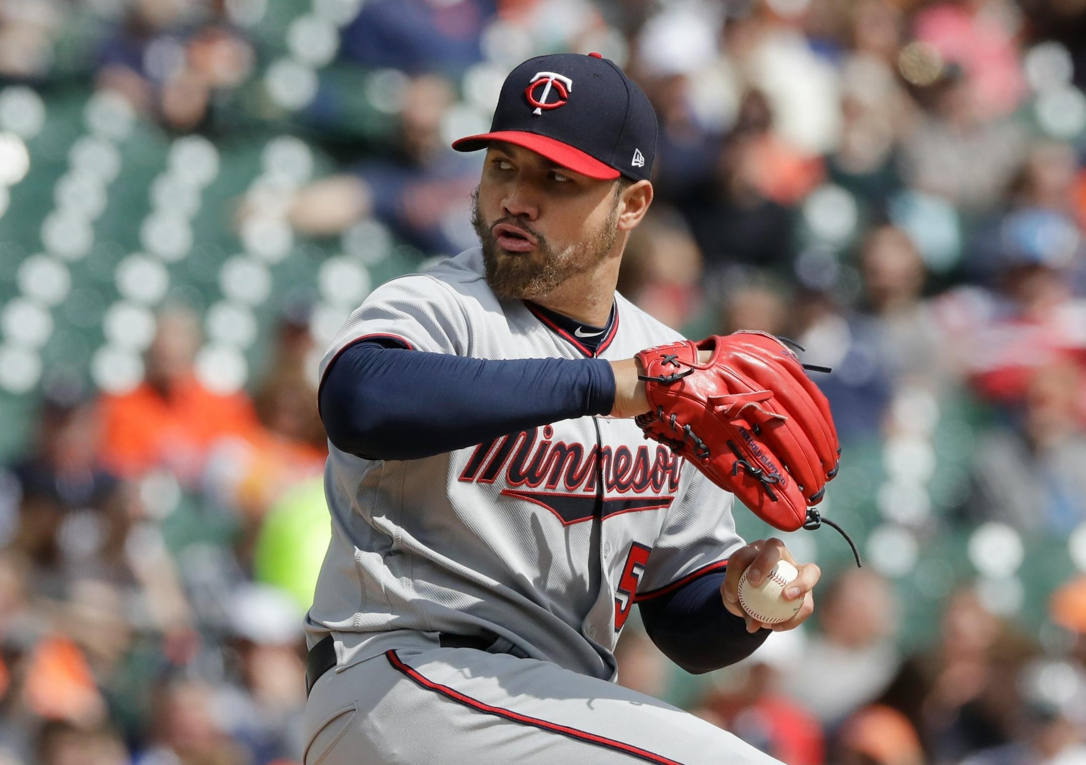 Minnesota Twins starting pitcher Hector Santiago throws during the fourth inning of a baseball game against the Detroit Tigers, Tuesday, April 11, 2017, in Detroit.