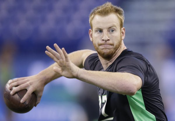 North Dakota State quarterback QB Carson Wentz, showing off his arm at February&#x2019;s NFL combine, is expected be a top draft pick despite relative