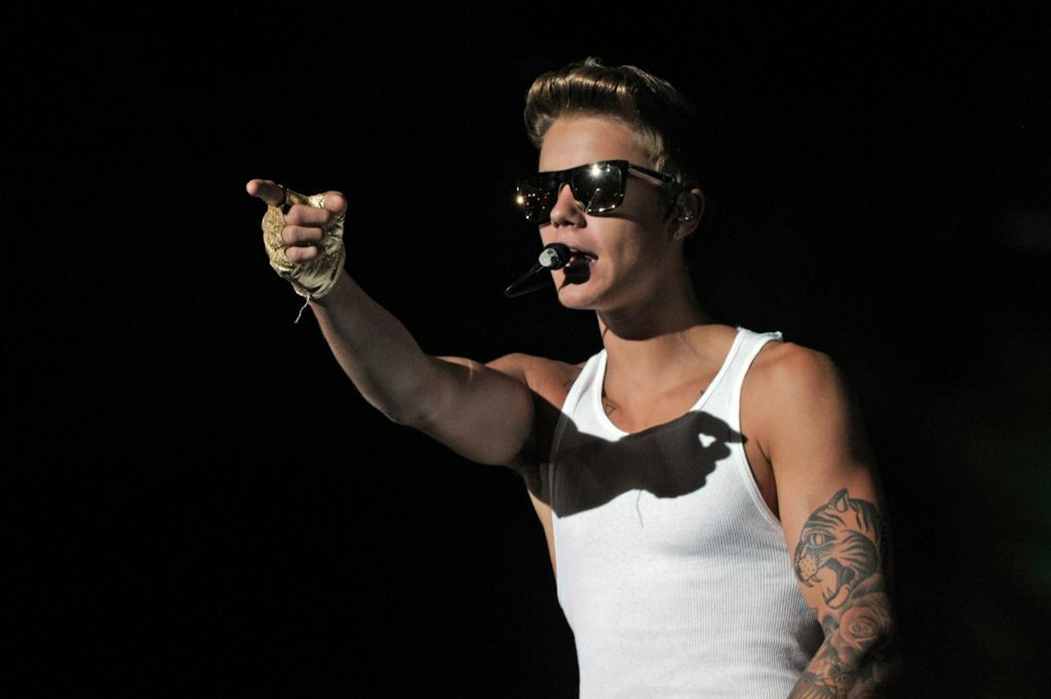Justin Bieber performs at a closing concert in Singapore Monday, Sept. 23, 2013, a day after the Singapore Formula One Grand Prix.