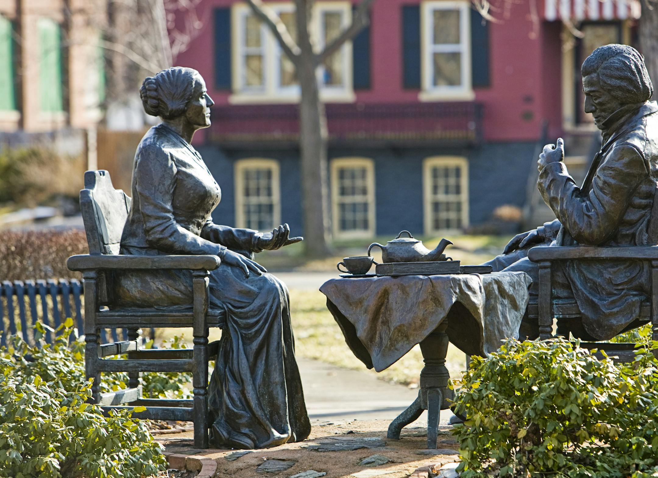 In an undated handout photo, "Let's Have Tea," a statue in the Susan B. Anthony Park in Rochester N.Y. depicting Frederick Douglass visiting the women's suffrage leader. Anthony's home in Rochester and other sites in nearby Seneca Falls and Waterloo related to the women's reform movement are the focus of tourism initiatives in March. (National Susan B. Anthony Museum & House via The New York Times) -- PHOTO MOVED IN ADVANCE AND NOT FOR USE - ONLINE OR IN PRINT - BEFORE MARCH 09, 2014. -- NO SALE