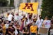 Sept: 16: Gophers student athletes rallied outside Morrill Hall to protest against plans to cut four men's sports from the school's athletic program.
