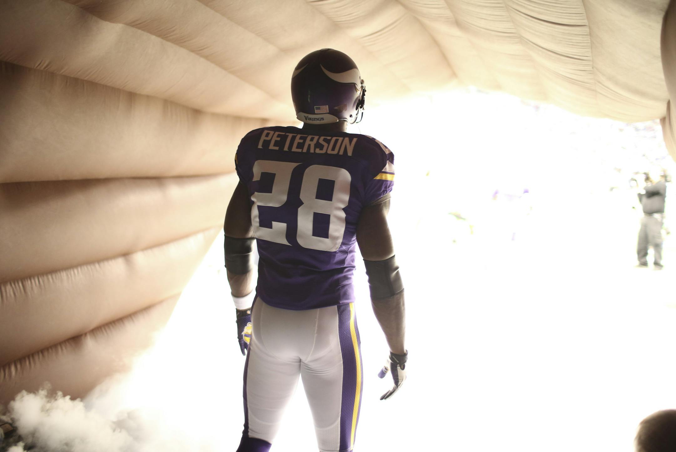 The Minnesota Vikings eeked out a 23-20 overtime win over the Chicago Bears in an NFL football game Sunday afternoon, December 1, 2013 and Mall of America Field in Minneapolis. Minnesota Vikings running back Adrian Peterson (28) waited in the tunnel before being introduced before Sunday's game. ] JEFF WHEELER &#x201a;&#xc4;&#xa2; jeff.wheeler@startribune.com ORG XMIT: MIN1312011800522544