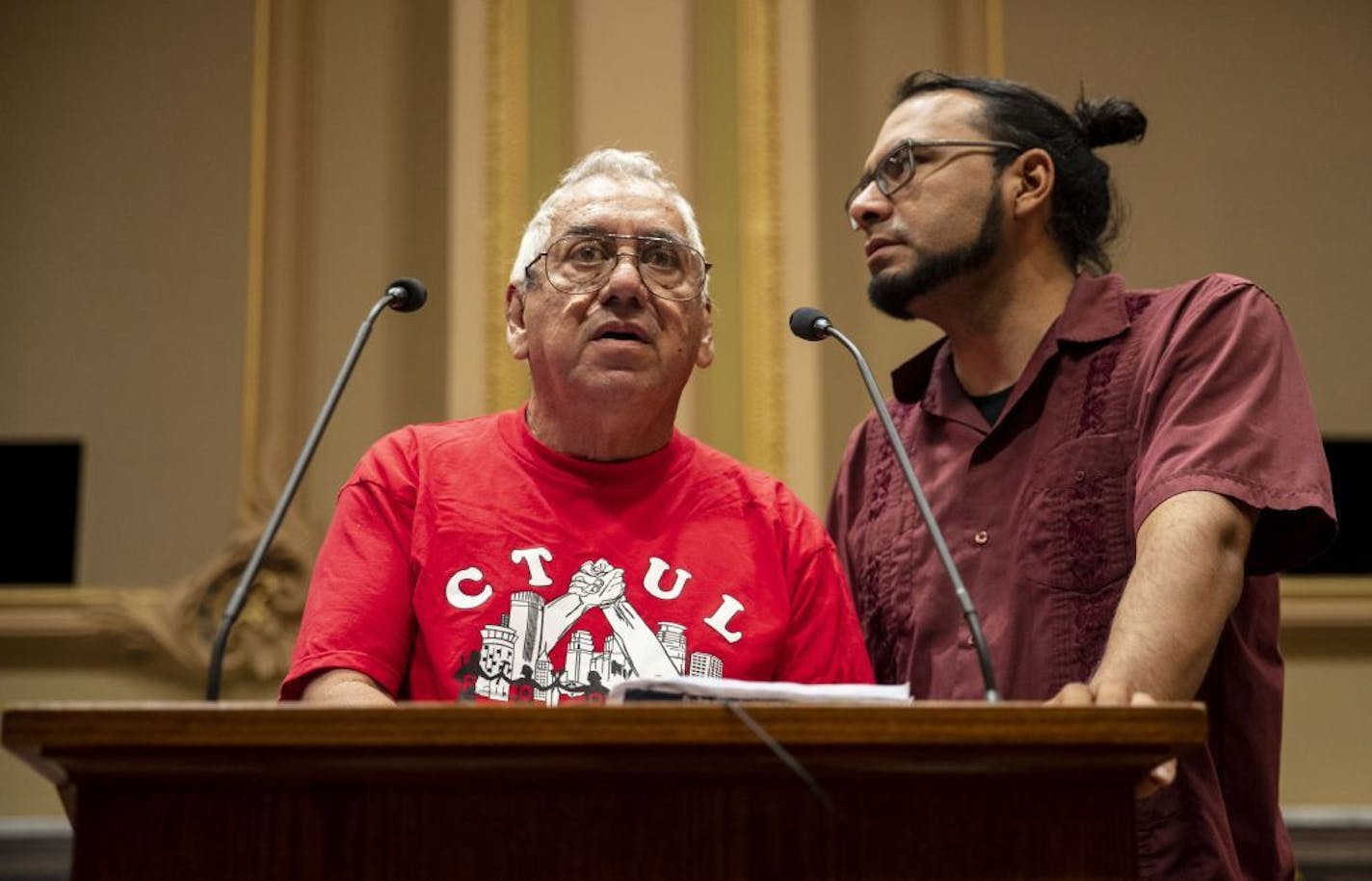 (Left) Humberto Miceli and his friend and translator, Israel Aranda, testified before the Minneapolis city council about Miceli's experiences with wage theft. ALEX KORMANN • alex.kormann@startribune.com Dozens of workers gathered in front of the Hennepin County Government Center to rally in support of a new city ordinance that would provide protection for employees against wage theft. After the rally a few supporters attended a city council meeting to air their thoughts before the council voted