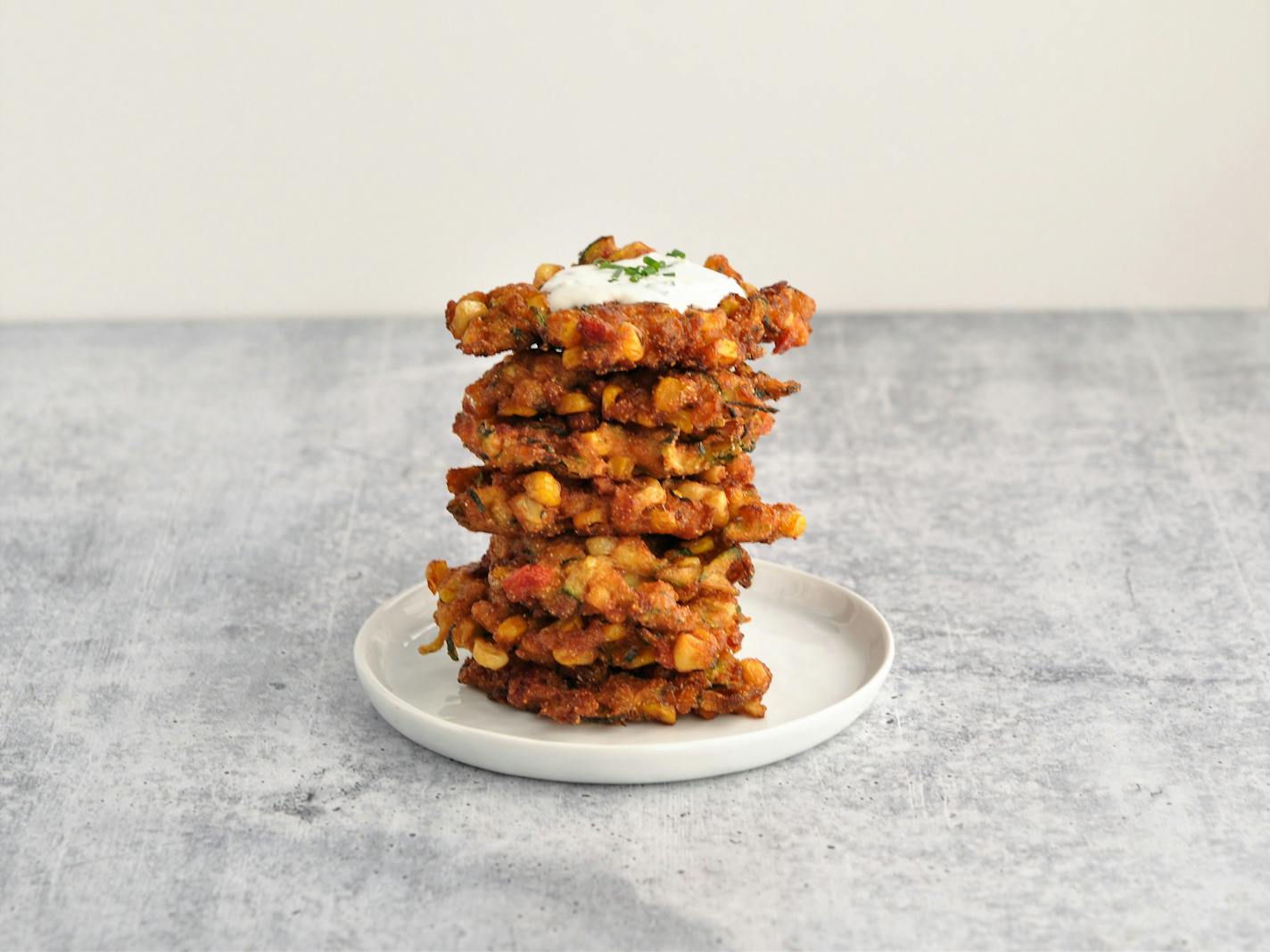 Corn and Zucchini Fritters with Parmesan Chive Dipping Sauce. Recipe and photo by Meredith Deeds, Special to the Star Tribune