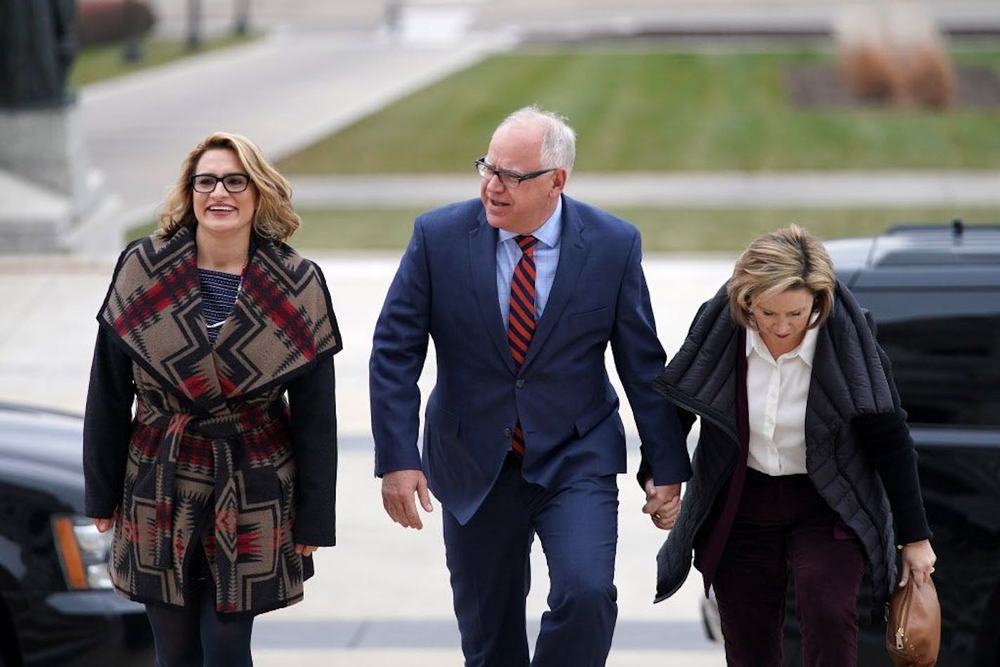 Lt. Gov.-elect Peggy Flanagan, Gov.-elect Tim Walz, and his wife, Gwen, arrived at the State Capitol Thursday morning.