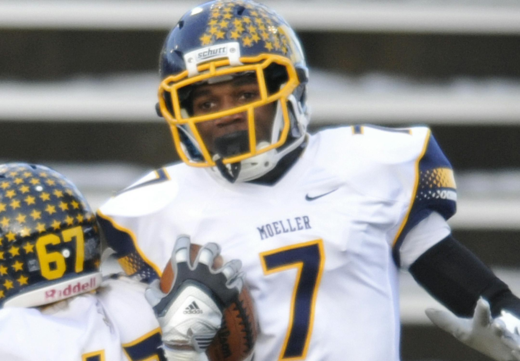 Moeller wide receiver Isaiah Gentry (7) celebrates a touchdown catch with lineman Schuyler Hahn in the second quarter of the Ohio Division I high school football championship game Saturday, Dec. 7, 2013, in Canton, Ohio. (AP Photo/David Richard) ORG XMIT: OHDR101