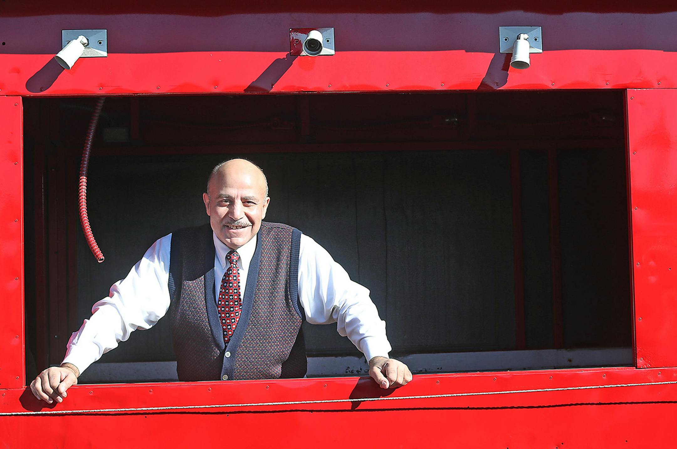 Sam Fauzy stood inside his Popcorn Wagon, which is currently in storage, Thursday, October 13, 2016 in St. Paul, MN. Fauzy has been told it won't be allowed on the Nicollet Mall, where he has sold treats since the early 2000s. ] (ELIZABETH FLORES/STAR TRIBUNE) ELIZABETH FLORES &#x2022; eflores@startribune.com