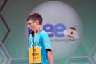 William Rausch, 11, of Royalton, Minn., reacts after spelling his word incorrectly during the quarterfinals of the Scripps National Spelling Bee, in O
