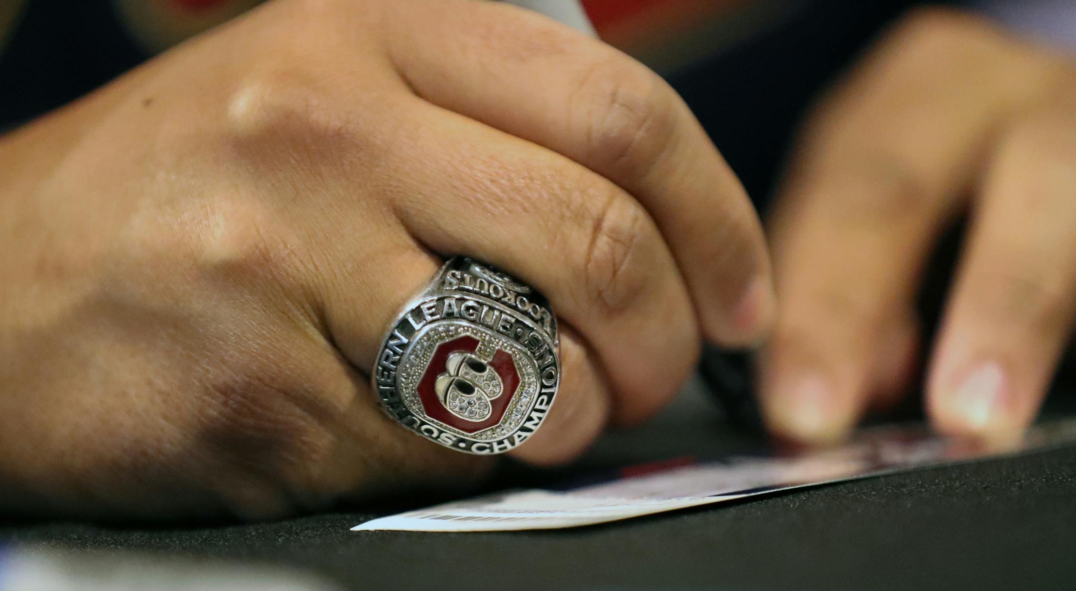 Minnesota Twins pitcher Fernando Romero wore a Chattanooga Lookouts championship ring while signing autographs for fans at TwinsFest.