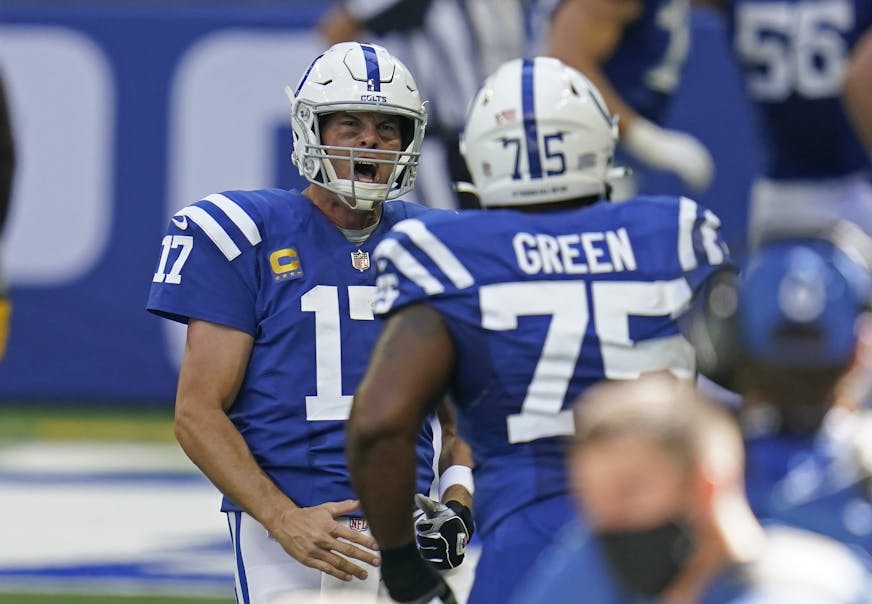 Indianapolis Colts quarterback Philip Rivers (17) reacts after throwing a touchdown pass during the second half of an NFL football game against the Minnesota Vikings, Sunday, Sept. 20, 2020, in Indianapolis. (AP Photo/Michael Conroy)