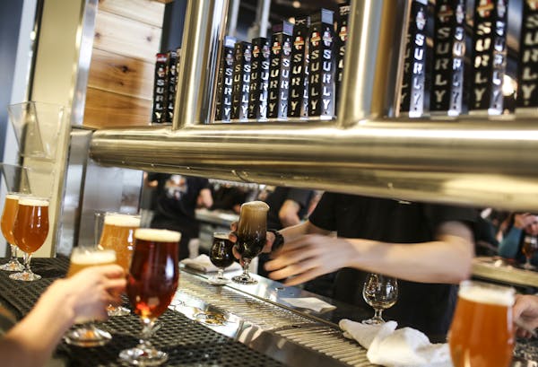 Beers being poured at the Surly brew-pub tap room public grand opening in Minneapolis, Minn. on Friday, December 19, 2014. ] REN&#xc9;E JONES SCHNEIDE