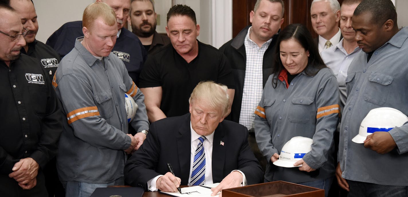 U.S. President Donald Trump signs the Section 232 Proclamations on Steel and Aluminum Imports during a ceremony at the White House Thursday, March 8, 2018 in Washington, D.C. (Olivier Douliery/Abaca Press/TNS) ORG XMIT: 1230004