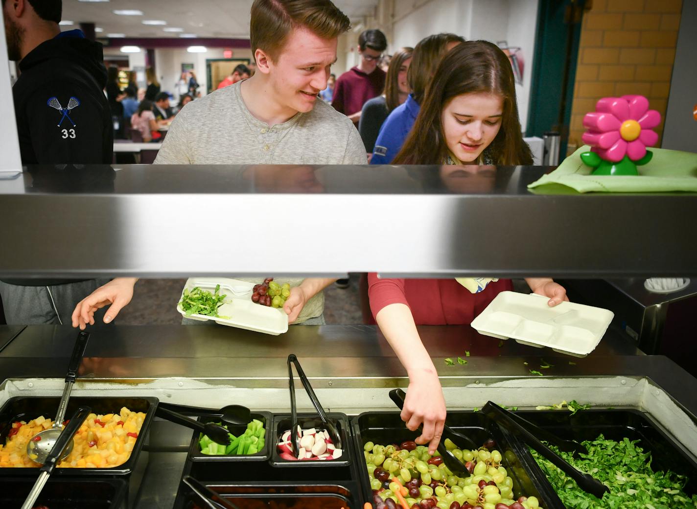 On their plates: Isaiah Damitz and Ellie Boisen went through the lunch line at Owatonna High School, taking the requisite mix of healthful options. Republicans are making changes to the Obama-era nutrition rules.