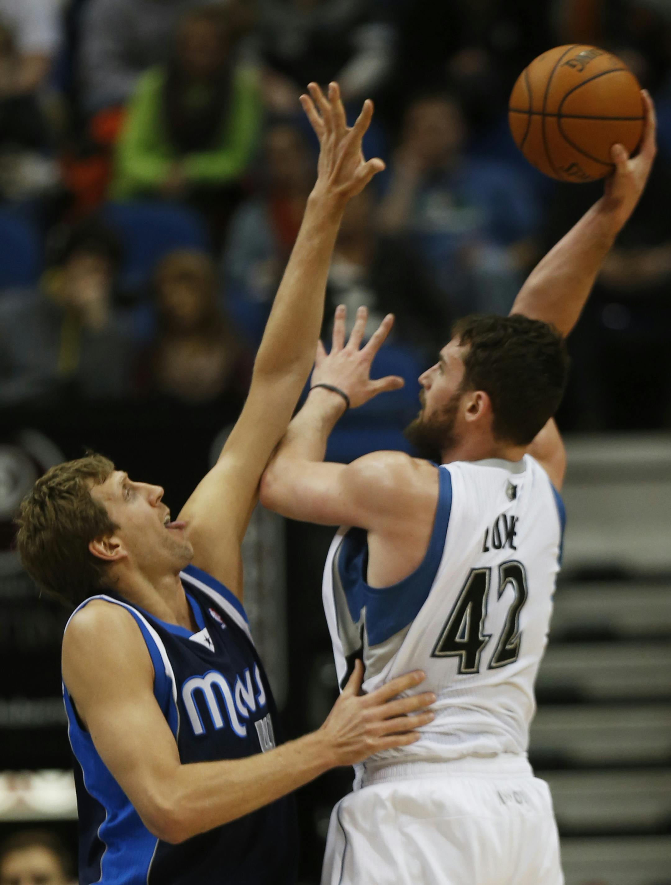 At the Target Center in a game between Dallas and the Wolves, Dirk Nowitzki defends against Kevin Love(42) in the first half.]richard tsong-taatarii/rtsong-taatarii@startribune.com