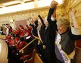 Equal Rights Amendment supporter Donna Granski, right, from Midlothian Va., cheers the passage of the House ERA Resolution in the Senate chambers at t