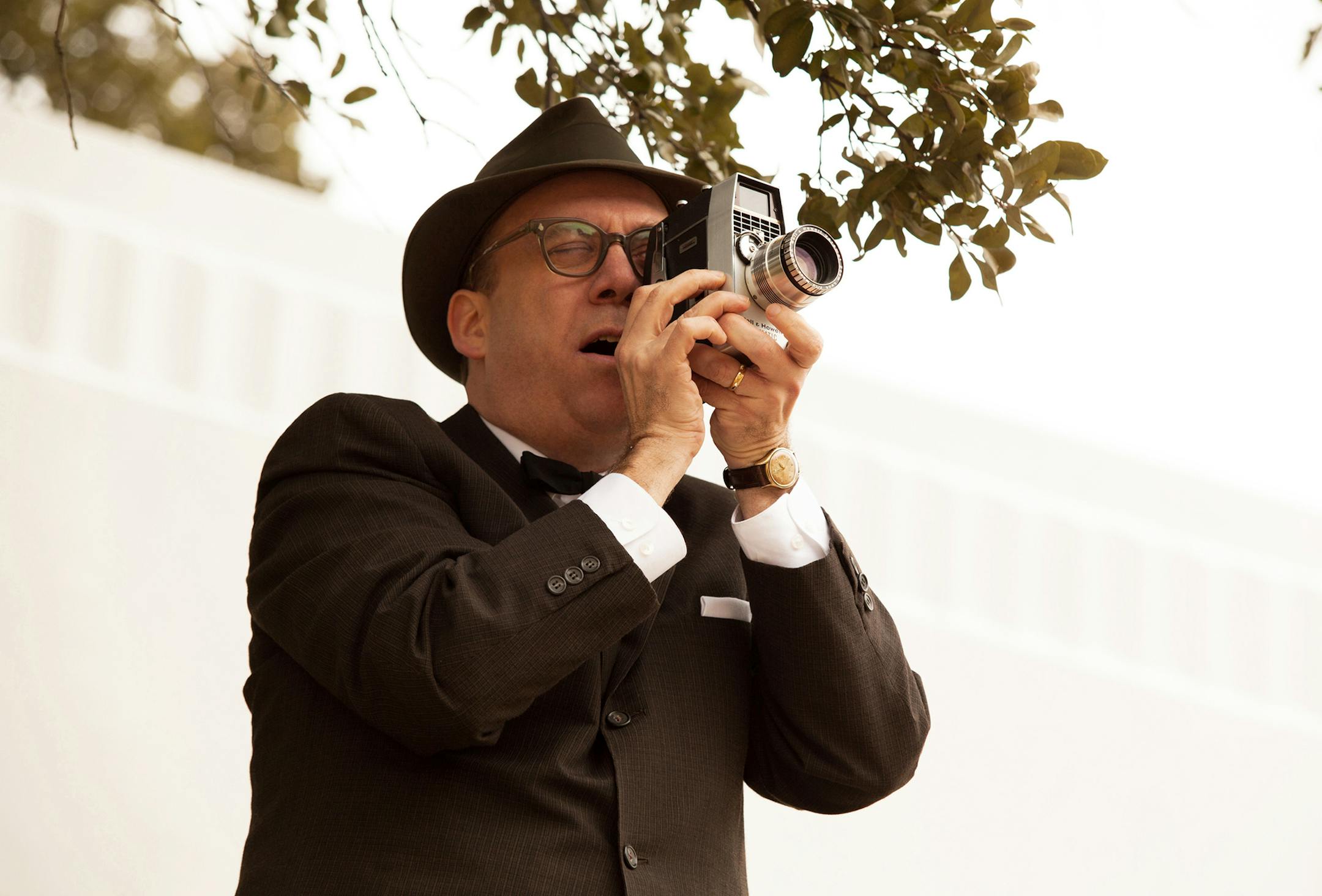 This film image released by Exclusive Media Entertainment shows Paul Giamatti as Abraham Zapruder in a scene from "Parkland." Giamatti plays the unlikely documentarian in the new film ‚ÄúParkland,‚Äù which arrives in theater‚Äôs just before the 50th anniversary of the Nov. 22, 1963 assassination. The film recounts the chaotic events that occurred in and around the eponymous hospital after the president was brought there with hopes of saving his