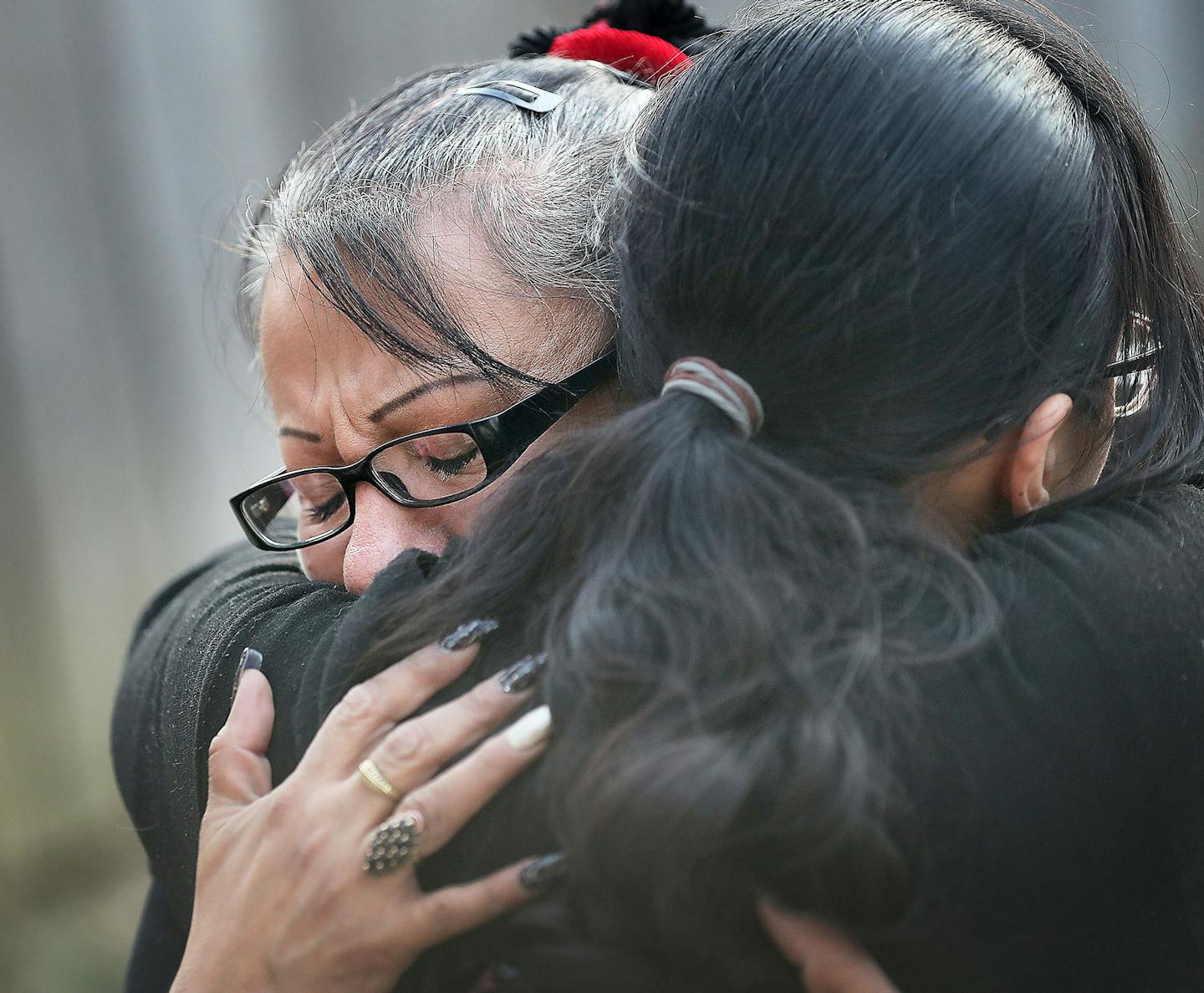 Members of Natives Against Heroin organized a vigil for Amber Hopkins that was attended by many of Amber's family members and friends as well as those, including strangers, who just wanted to recognize the young mother's life. Here, Amber's mother Danita Torrence, left, is hugged by a well wisher during the ceremony and seen Wednesday, March 27, 2019, in Minneapolis, MN.] DAVID JOLES &#x2022;david.joles@startribune.com Amber Hopkins had been missing for 10 weeks when passersby discovered a body