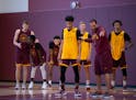 Gophers coach Ben Johnson explained a drill to guard Eylijah Stephens at the team’s first practice Tuesday afternoon. 